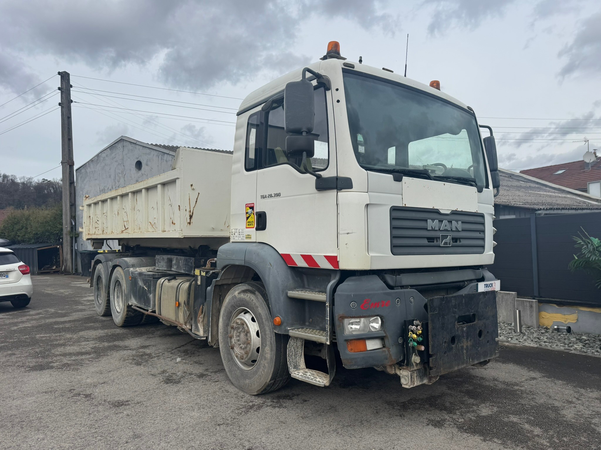 Vehicule MAN TGA 28.390 6X4 AMPLIROLL – Benne S2B Construction – Bras Dalby